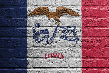 Image showing Brick wall with a painting of a flag, Iowa