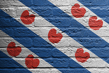 Image showing Brick wall with a painting of a flag, Friesland