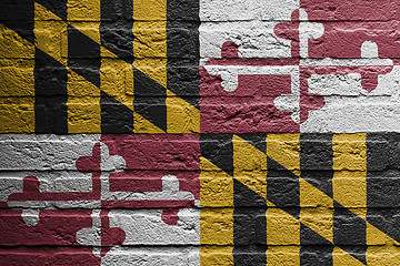 Image showing Brick wall with a painting of a flag, Maryland