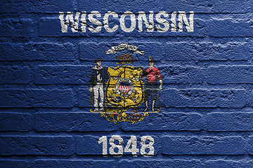 Image showing Brick wall with a painting of a flag, Wisconsin