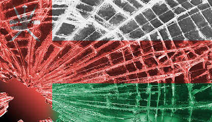 Image showing Broken glass or ice with a flag, Oman