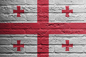 Image showing Brick wall with a painting of a flag, Georgia