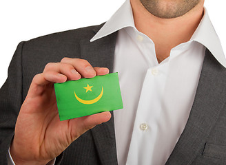 Image showing Businessman is holding a business card, Mauritania