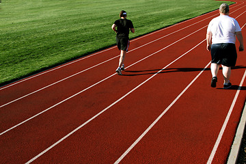 Image showing Couple On A Racetrack