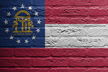 Image showing Brick wall with a painting of a flag, Georgia