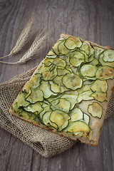 Image showing Sliced pizza with zucchini