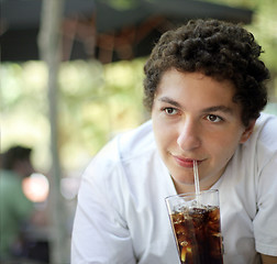 Image showing Boy drinking coke