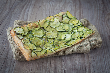 Image showing Sliced pizza with zucchini
