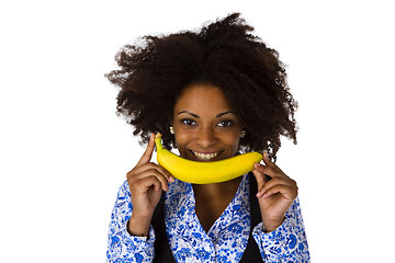 Image showing Young afro american with banana