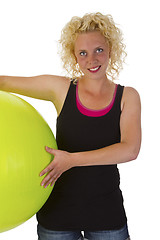 Image showing Beautiful young woman with gym ball