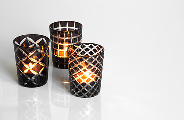 Image showing Tealights in black and white candleholders