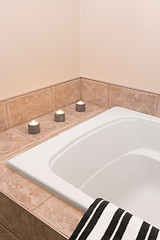 Image showing Bathroom decorated with candle lights