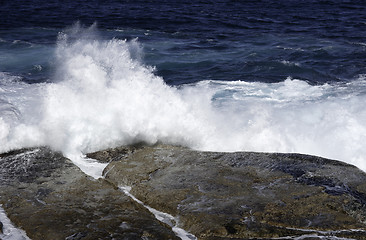 Image showing ocean waves crashing on rocks