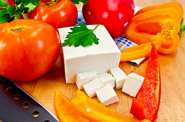 Image showing Feta cheese with vegetables on the board