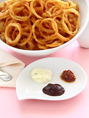 Image showing Onion Rings And Condiments