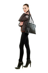 Image showing Pretty brunette with a bag