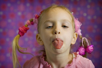 Image showing Little girl making faces