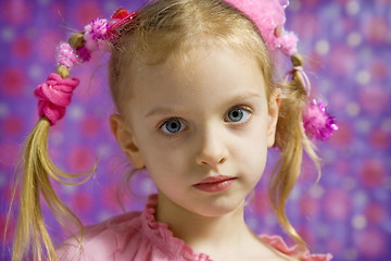 Image showing Little girl making faces