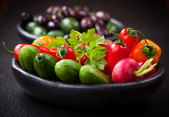 Image showing Raw snack vegetable with olives