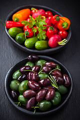 Image showing Mixed olives with raw snack vegetable