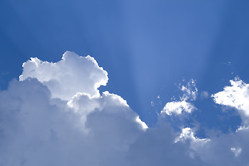 Image showing Sunny clouds with rays of light