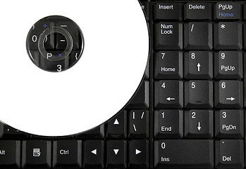 Image showing White CD on a laptop keyboard