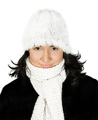 Image showing Girl in white knit cap and scarf