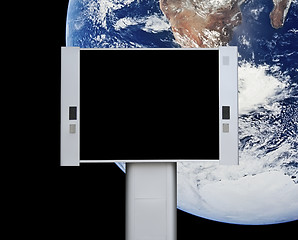 Image showing Blank advertising billboard with earth background