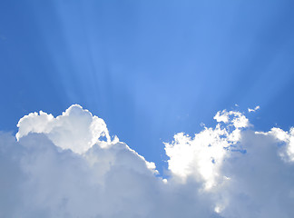 Image showing Sunny clouds with rays of light