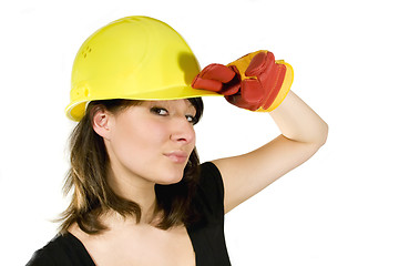 Image showing Girl in yellow hard hat and red gloves