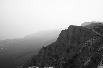 Image showing Top of the mountain with green forest above