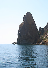 Image showing Rocks and endless sea with clear blue sky