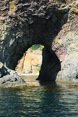 Image showing Mountain on a rocky coastline.View from sea.