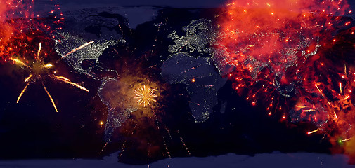 Image showing Fireworks with earth at night image.New year on the earth.High r