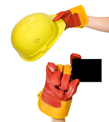 Image showing Red glove holding an empty frame and glove holding a yellow hard