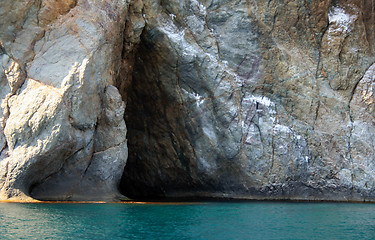 Image showing Rocks and endless sea with clear blue sky