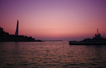 Image showing Sunset sea with boat crossing the bay