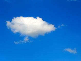 Image showing Puffy clouds on blue sky