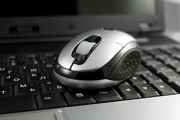 Image showing Mouse on a laptop keyboard