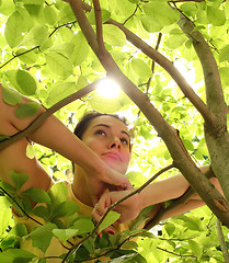 Image showing Young beautiful woman outdoors in sunny park