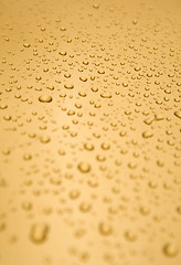 Image showing Abstract orange drops of water background