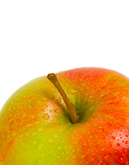 Image showing Fresh ripe apple with drops of water