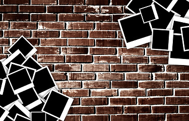 Image showing Empty instant photos on grunge brick wall background