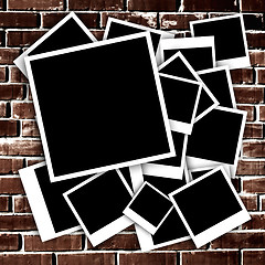 Image showing Empty instant photos on grunge brick wall background