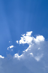 Image showing Sunny clouds with rays of light