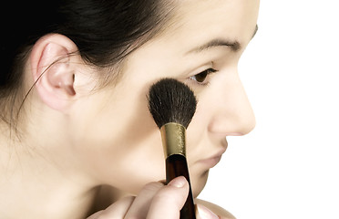 Image showing Sexy girl putting make-up