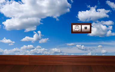 Image showing Energy outlet with blue sky background