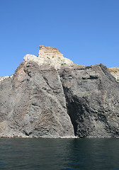 Image showing Mountain on a rocky coastline.View from sea.