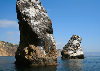 Image showing Mountain on a rocky coastline.View from sea.