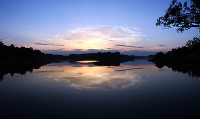 Image showing Romantic sunset on the lake with fog